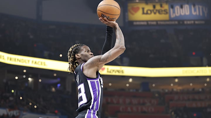 Apr 9, 2024; Oklahoma City, Oklahoma, USA; Sacramento Kings guard Keon Ellis (23) shoots a three-point basket against the Oklahoma City Thunder during the first quarter at Paycom Center. Mandatory Credit: Alonzo Adams-Imagn Images