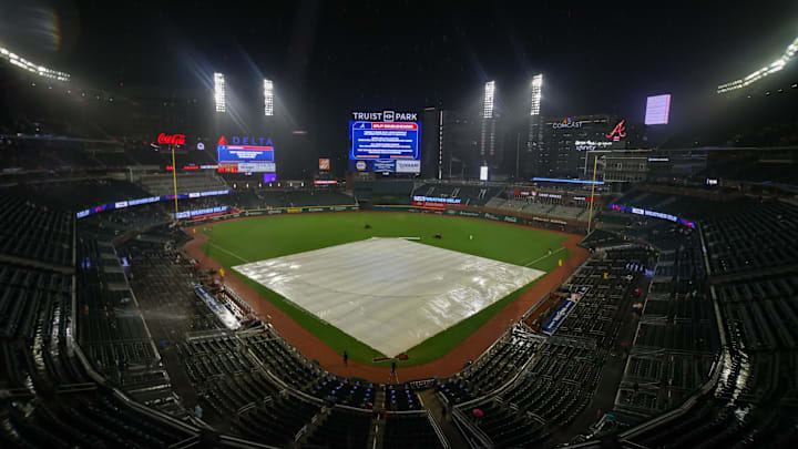 Jul 19, 2024; Atlanta, Georgia, USA; A view of the tarp on the field at Truist Park after a game between the Atlanta Braves and St. Louis Cardinals was canceled due to weather. Mandatory Credit: Brett Davis-Imagn Images
