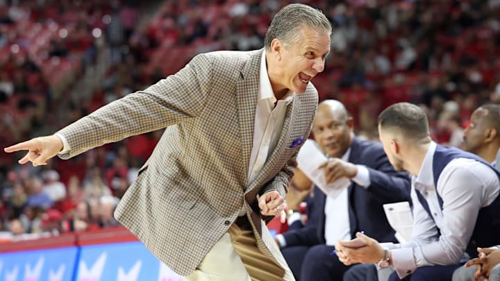 Nov 25, 2024; Fayetteville, Arkansas, USA; Arkansas Razorbacks head coach John Calipari reacts toward the bench during the second half against the Maryland Eastern Shore Hawks at Bud Walton Arena. Arkansas won 109-35. Mandatory Credit: Nelson Chenault-Imagn Images