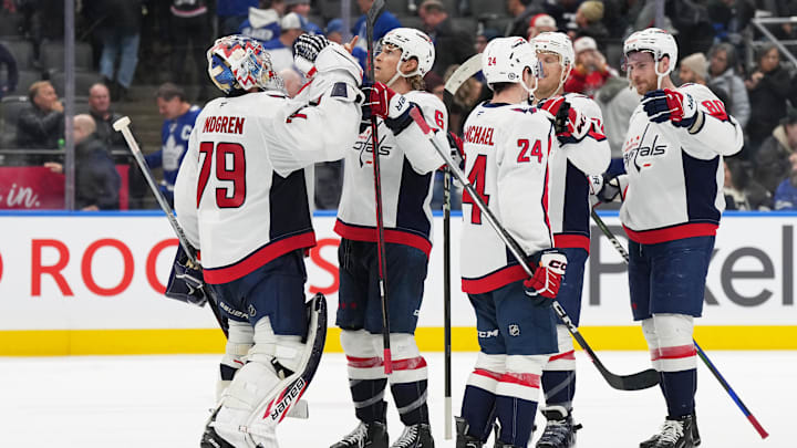 Dec 6, 2024; Toronto, Ontario, CAN; Washington Capitals defenseman Jakob Chychrun (6) celebrates the win with goaltender Charlie Lindgren (79) against the Toronto Maple Leafs at the end of the third period at Scotiabank Arena. Mandatory Credit: Nick Turchiaro-Imagn Images