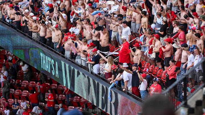 A section of shirtless fans were present at the Cardinals-Royals rivalry game. 