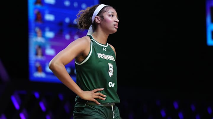 Jan 17, 2025; Miami, FL, USA; Angel Reese (5) of the Rose takes a moment against the Vinyl during a timeout in the first half of the Unrivaled women’s professional 3v3 basketball league at Wayfair Arena. 
