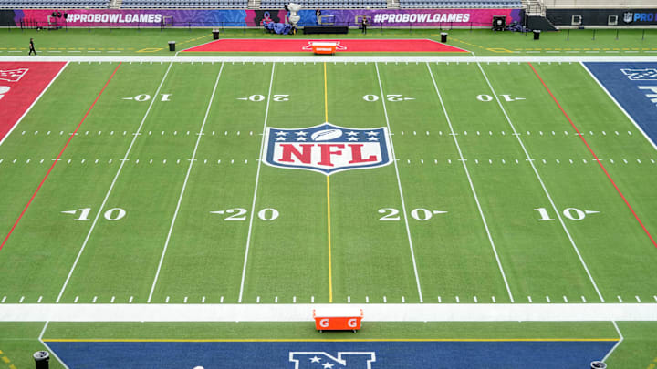 Feb 1, 2025; Orlando, FL, USA; An overall view of the NFL shield logo at midfield on the Camping World Stadium flag football field. Mandatory Credit: Kirby Lee-Imagn Images