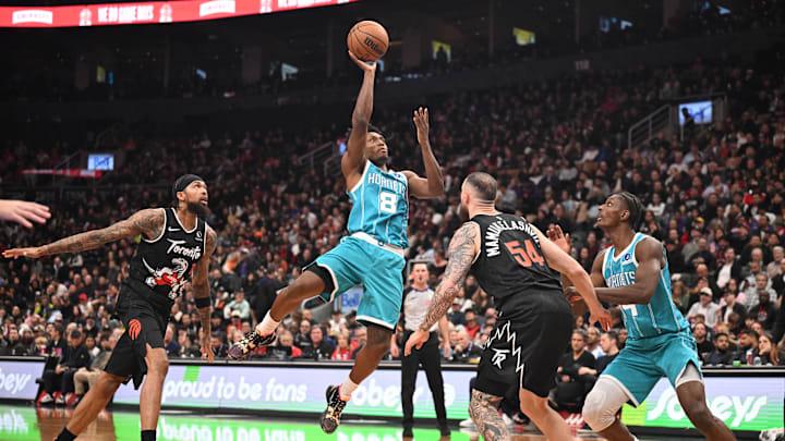 Nov 17, 2025; Toronto, Ontario, CAN; Charlotte Hornets guard Collin Sexton (8) shoots the ball against the Toronto Raptors in the second half at Scotiabank Arena. Mandatory Credit: Dan Hamilton-Imagn Images Nov 17, 2025; Toronto, Ontario, CAN; Charlotte Hornets guard Collin Sexton (8) shoots the ball against the Toronto Raptors in the second half at Scotiabank Arena. Mandatory Credit: Dan Hamilton-Imagn Images
