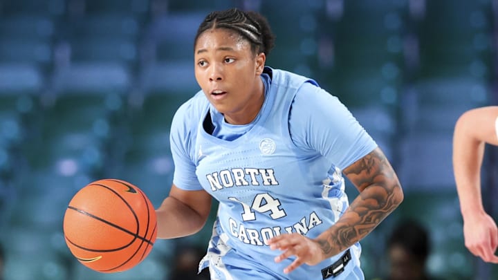 Nov 25, 2024; Paradise Island, Bahamas, BHS; North Carolina Tar Heels guard Trayanna Crisp (14) dribbles during the second half against the Indiana Hoosiers at the Atlantis Resort. Mandatory Credit: Kevin Jairaj-Imagn Images