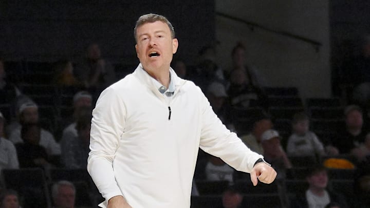 Nov 3, 2025; Nashville, Tennessee, USA;  Vanderbilt Commodores head coach Mark Byington yells to his team against the Lipscomb Bisons during the second half at Memorial Gymnasium. Mandatory Credit: Steve Roberts-Imagn Images