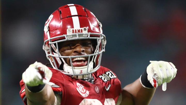 Jan 11, 2021; Miami Gardens, Florida, USA; Alabama Crimson Tide running back Najee Harris (22) celebrates a touchdown against the Ohio State Buckeyes in the 2021 College Football Playoff National Championship Game. 