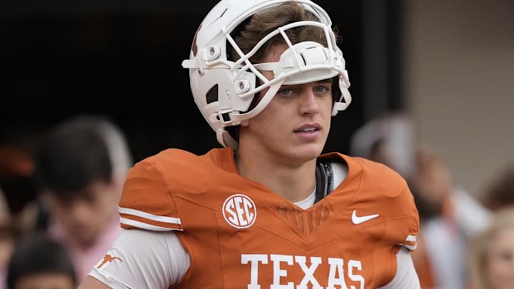 Nov 1, 2025; Austin, Texas, USA; Texas Longhorns quarterback Arch Manning (16) pauses while warming up before a game against the Vanderbilt Commodores at Darrell K Royal-Texas Memorial Stadium. Mandatory Credit: Scott Wachter-Imagn Images
