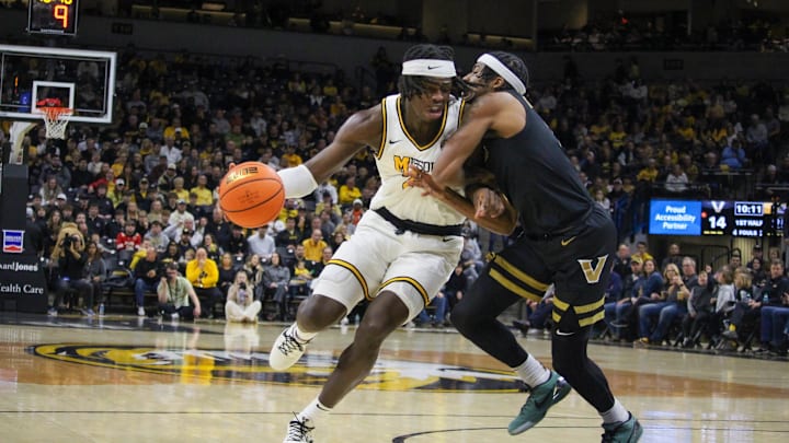 Jan 11, 2025; Columbia, Missouri, USA; Missouri Tigers forward Mark Mitchell pushes engages with a defender during a game against the Vanderbilt Commodores at Mizzou Arena. Jan 11, 2025; Columbia, Missouri, USA; Missouri Tigers forward Mark Mitchell pushes engages with a defender during a game against the Vanderbilt Commodores at Mizzou Arena.