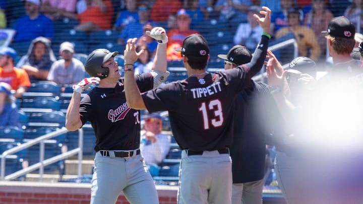 Gamecocks utility Ethan Petry (20) celebrates his two run homer in the top of the third inning against Florida. The Gators beat the Gamecocks 11-9 in Game 3 of the weekend series at Condron Family Ballpark in Gainesville, Florida, Sunday, April 14, 2024. [Cyndi Chambers/ Gainesville Sun] 2024