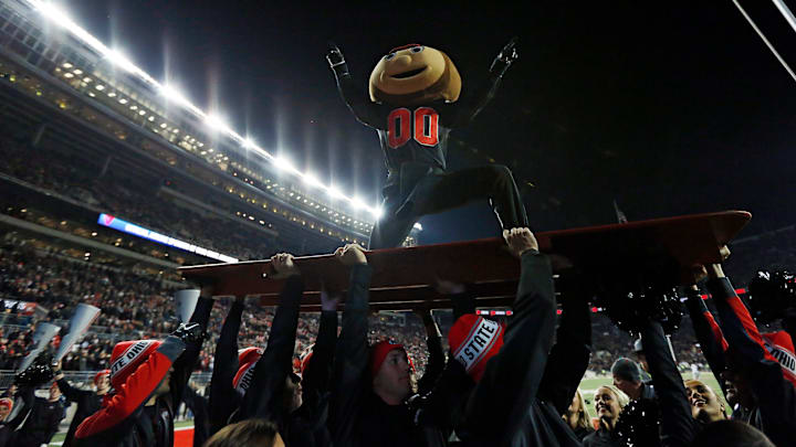 Ohio State mascot Brutus Buckeye wears a black jersey during the fourth quarter of the NCAA football game against the Penn State Nittany Lions at Ohio Stadium. Ohio State mascot Brutus Buckeye wears a black jersey during the fourth quarter of the NCAA football game against the Penn State Nittany Lions at Ohio Stadium.