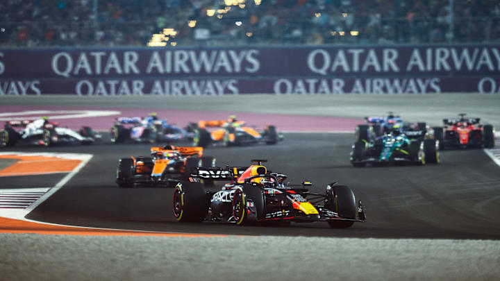 LUSAIL CITY, QATAR - OCTOBER 08: Max Verstappen of the Netherlands driving the (1) Oracle Red Bull Racing RB19 leads Oscar Piastri of Australia driving the (81) McLaren MCL60 Mercedes during the F1 Grand Prix of Qatar at Lusail International Circuit on October 08, 2023 in Lusail City, Qatar. (Photo by Clive Rose/Getty Images)