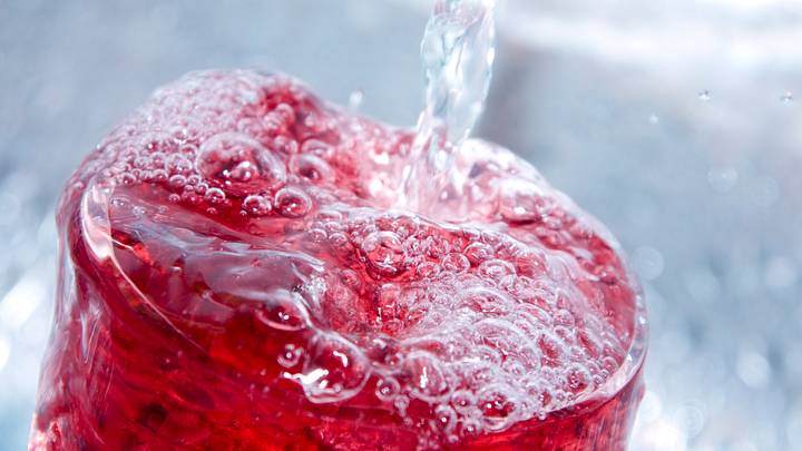 Close-up of a bubbly red drink
