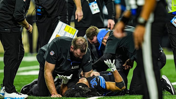 Detroit Lions cornerback Khalil Dorsey (30) lays on the ground after being injured during a play during the first half at Ford Field in Detroit on Sunday, Dec. 15, 2024. He was carted off the field. Detroit Lions cornerback Khalil Dorsey (30) lays on the ground after being injured during a play during the first half at Ford Field in Detroit on Sunday, Dec. 15, 2024. He was carted off the field.