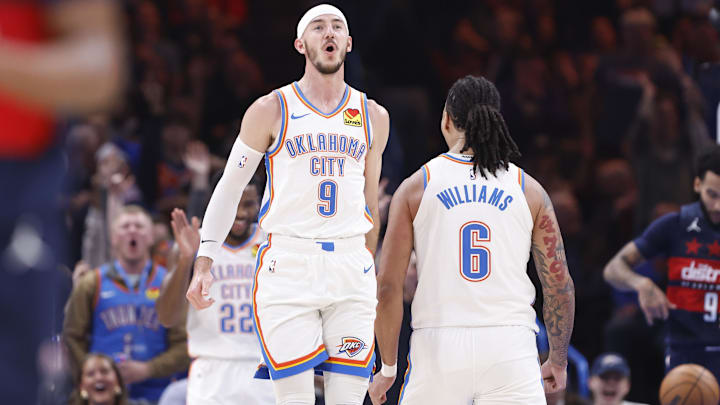Dec 23, 2024; Oklahoma City, Oklahoma, USA; Oklahoma City Thunder guard Alex Caruso (9) celebrates after his team scores against the Washington Wizards during the second quarter at Paycom Center. Mandatory Credit: Alonzo Adams-Imagn Images
