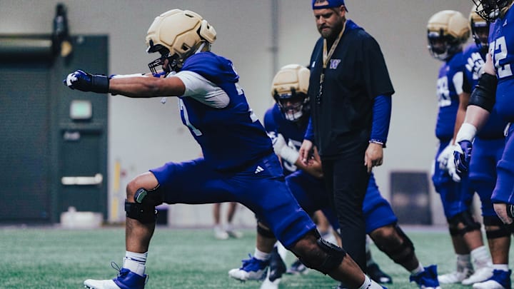 Max McCree takes a big step during this spring drill. Max McCree takes a big step during this spring drill.