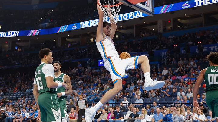 Oct 7, 2026; Oklahoma City, Oklahoma, USA; Oklahoma City Thunder center Aday Mara (15) dunks against the Milwaukee Bucks during the first half of a preseason game at Paycom Center. Mandatory Credit: Alonzo Adams-Imagn Images