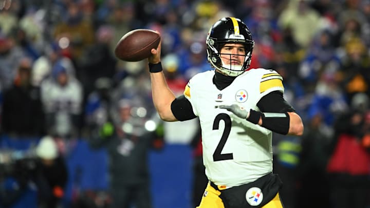 Jan 15, 2024; Orchard Park, New York, USA; Pittsburgh Steelers quarterback Mason Rudolph (2) plays the  ball in the second half against the Buffalo Bills in a 2024 AFC wild card game at Highmark Stadium. Mandatory Credit: Mark Konezny-Imagn Images