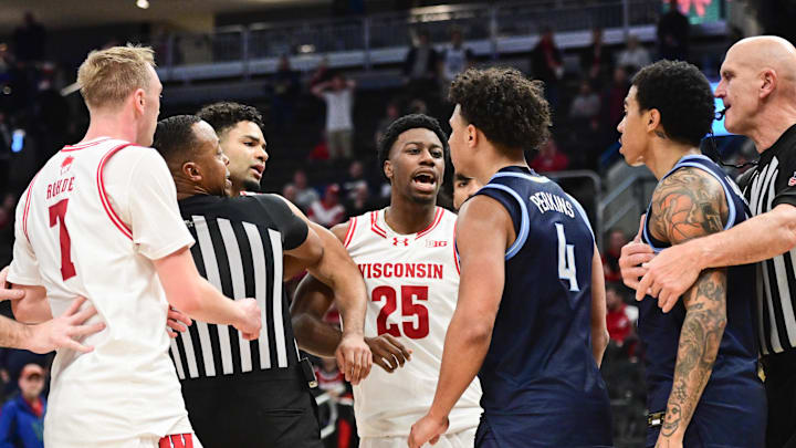 Dec 19, 2025; Milwaukee, Wisconsin, USA; Tempers flared in the final seconds of game between Wisconsin Badgers and Villanova Wildcats at the Fiserv Forum. 