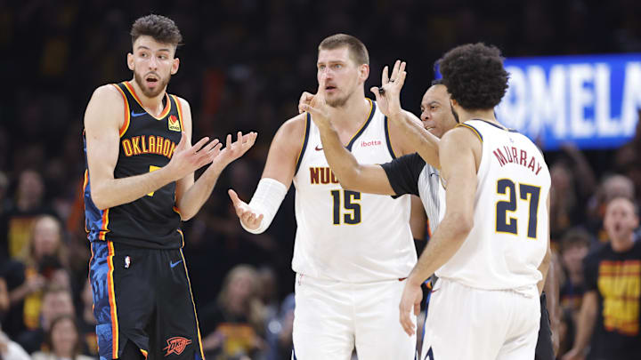 May 5, 2025; Oklahoma City, Oklahoma, USA; Oklahoma City Thunder forward Chet Holmgren (7) and Denver Nuggets center Nikola Jokic (15) react to a play during the second half in game one of the second round for the 2025 NBA Playoffs at Paycom Center. Mandatory Credit: Alonzo Adams-Imagn Images May 5, 2025; Oklahoma City, Oklahoma, USA; Oklahoma City Thunder forward Chet Holmgren (7) and Denver Nuggets center Nikola Jokic (15) react to a play during the second half in game one of the second round for the 2025 NBA Playoffs at Paycom Center. Mandatory Credit: Alonzo Adams-Imagn Images