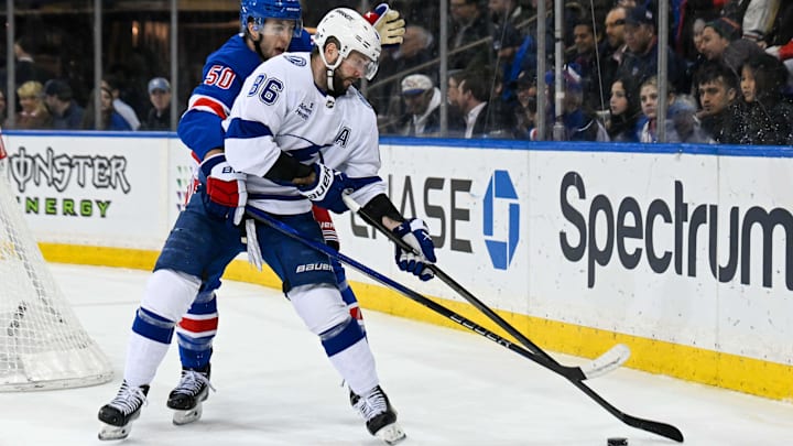 Apr 7, 2025; New York, New York, USA;  New York Rangers left wing Will Cuylle (50) gets called for holding on Tampa Bay Lightning right wing Nikita Kucherov (86) during the third period at Madison Square Garden. Mandatory Credit: Dennis Schneidler-Imagn Images