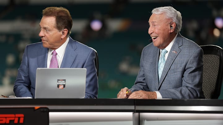 Jan 9, 2025; Miami, FL, USA; ESPN analysts Nick Saban and Lee Corso before the game between the Notre Dame Fighting Irish and the Penn State Nittany Lions in the Orange Bowl at Hard Rock Stadium. Mandatory Credit: Nathan Ray Seebeck-Imagn Images