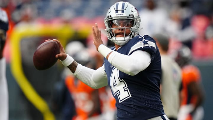 Dallas Cowboys quarterback Dak Prescott warms up before the preseason game against the Denver Broncos. Dallas Cowboys quarterback Dak Prescott warms up before the preseason game against the Denver Broncos.