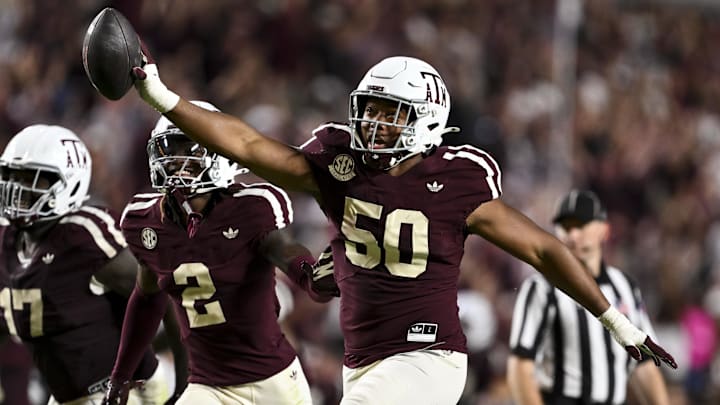 Texas A&M Aggies defensive end Dayon Hayes reacts after recovering a fumble in the fourth quarter against the Florida Gators at Kyle Field