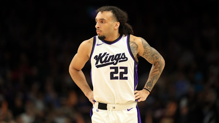 Mar 14, 2025; Phoenix, Arizona, USA; Sacramento Kings guard Devin Carter (22) against the Phoenix Suns at Footprint Center. Mandatory Credit: Mark J. Rebilas-Imagn Images