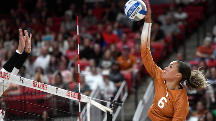 Texas' Madisen Skinner hits the ball against Texas Tech in a Big 12 volleyball match.