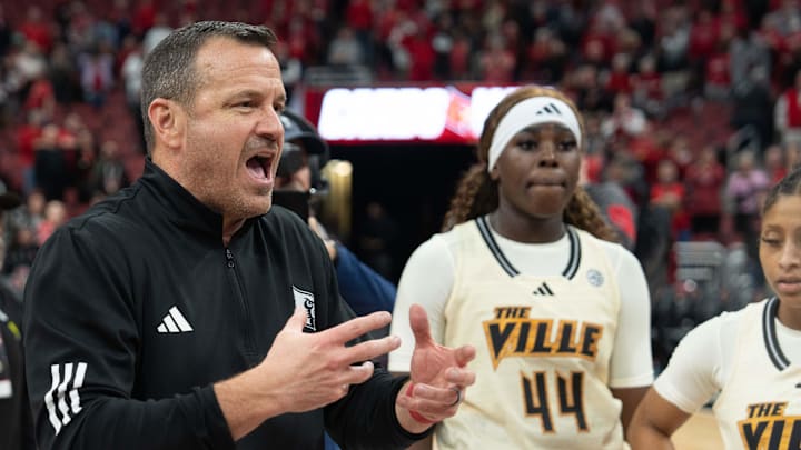 Louisville Cardinals head coach Jeff Walz talks to the team after their 73-66 win over Notre Dame Fighting Irish on Thursday, Feb. 8, 2024 at KFC YUM Center.