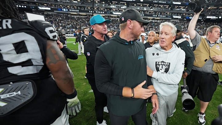Nov 2, 2025; Paradise, Nevada, USA; The Jacksonville Jaguars head coach Liam Coen and the Las Vegas Raiders head coach Pete Carroll meet after the win against the Las Vegas Raiders at Allegiant Stadium. Mandatory Credit: Kirby Lee-Imagn Images Nov 2, 2025; Paradise, Nevada, USA; The Jacksonville Jaguars head coach Liam Coen and the Las Vegas Raiders head coach Pete Carroll meet after the win against the Las Vegas Raiders at Allegiant Stadium. Mandatory Credit: Kirby Lee-Imagn Images