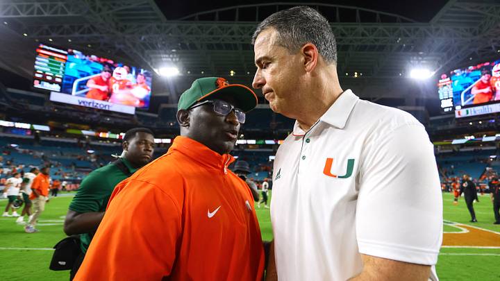 Sep 7, 2024; Miami Gardens, Florida, USA; Miami Hurricanes head coach Mario Cristobal and Florida A&M Rattlers head coach James Colzie III shake hands after the game at Hard Rock Stadium. Mandatory Credit: Sam Navarro-Imagn Images Sep 7, 2024; Miami Gardens, Florida, USA; Miami Hurricanes head coach Mario Cristobal and Florida A&M Rattlers head coach James Colzie III shake hands after the game at Hard Rock Stadium. Mandatory Credit: Sam Navarro-Imagn Images