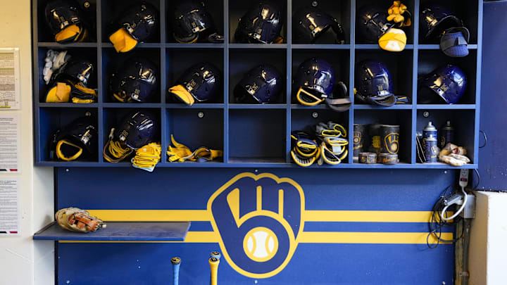 Sep 17, 2024; Milwaukee, Wisconsin, USA; General view of batting helmets inside the Milwaukee Brewers dugout prior to the game against the Philadelphia Phillies at American Family Field. Mandatory Credit: Jeff Hanisch-Imagn Images Sep 17, 2024; Milwaukee, Wisconsin, USA; General view of batting helmets inside the Milwaukee Brewers dugout prior to the game against the Philadelphia Phillies at American Family Field. Mandatory Credit: Jeff Hanisch-Imagn Images