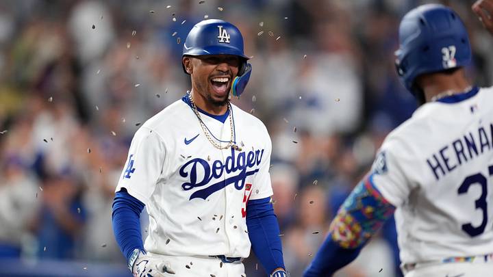 Sep 18, 2026; Los Angeles, California, USA; Los Angeles Dodgers shortstop Mookie Betts (50) is showered with sunflower seeds after hitting a two-run home run against the San Francisco Giants in the eighth inning at Dodger Stadium. Mandatory Credit: Kirby Lee-Imagn Images Sep 18, 2026; Los Angeles, California, USA; Los Angeles Dodgers shortstop Mookie Betts (50) is showered with sunflower seeds after hitting a two-run home run against the San Francisco Giants in the eighth inning at Dodger Stadium. Mandatory Credit: Kirby Lee-Imagn Images