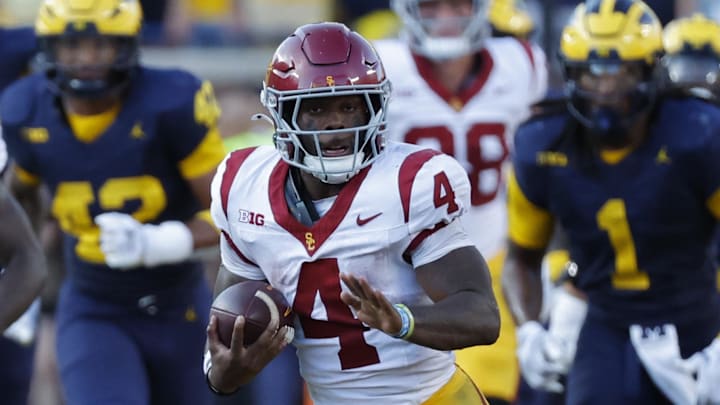 Sep 21, 2024; Ann Arbor, Michigan, USA;  USC Trojans running back Woody Marks (4) rushes against the Michigan Wolverines at Michigan Stadium. Mandatory Credit: Rick Osentoski-Imagn Images