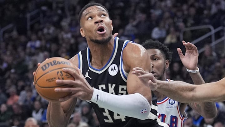 Jan 19, 2025; Milwaukee, Wisconsin, USA; Milwaukee Bucks forward Giannis Antetokounmpo (34) puts up a shot against the Philadelphia 76ers in the first half at Fiserv Forum. Mandatory Credit: Michael McLoone-Imagn Images