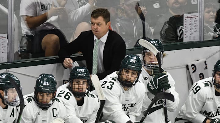 MSU Hockey Coach Adam Nightingale looks on during the Spartan's game against Boston College, Saturday, Oct. 12, 2024, at Munn Ice Arena in East Lansing. MSU won 4-3. MSU Hockey Coach Adam Nightingale looks on during the Spartan's game against Boston College, Saturday, Oct. 12, 2024, at Munn Ice Arena in East Lansing. MSU won 4-3.
