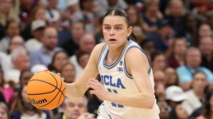 Apr 4, 2025; Tampa, FL, USA;  UCLA Bruins guard Gabriela Jaquez (11) dribbles against the Connecticut Huskies during second quarter in a semifinal of the women's 2025 NCAA tournament at Amalie Arena. Mandatory Credit: Nathan Ray Seebeck-Imagn Images