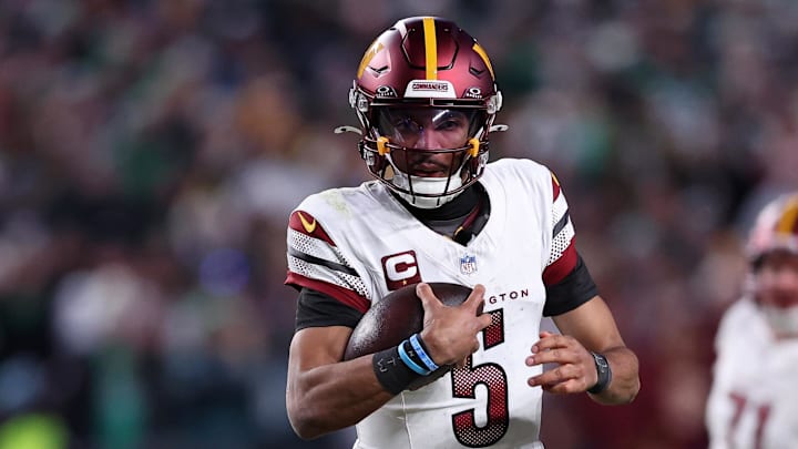 Jan 26, 2025; Philadelphia, PA, USA; Washington Commanders quarterback Jayden Daniels (5) runs with the ball