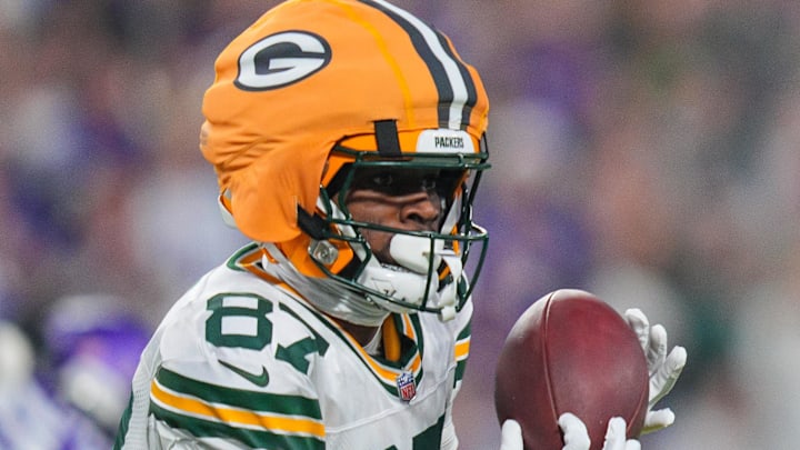 Green Bay Packers receiver Romeo Doubs catches a pass against Minnesota Vikings. Green Bay Packers receiver Romeo Doubs catches a pass against Minnesota Vikings.