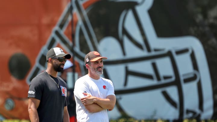 Browns general manager Andrew Berry, left, and head coach Kevin Stefanski watch practice during minicamp, Thursday, June 13, 2024, in Berea.