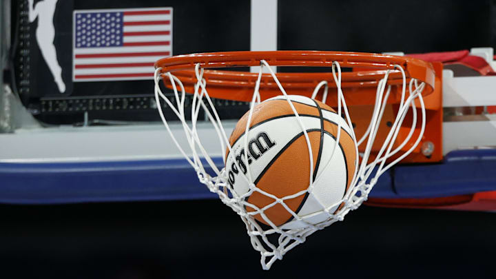 Aug 3, 2025; Chicago, Illinois, USA; Wilson basketball is seen next to WNBA logo before a game between the Chicago Sky and Phoenix Mercury at Wintrust Arena. Mandatory Credit: Kamil Krzaczynski-Imagn Images