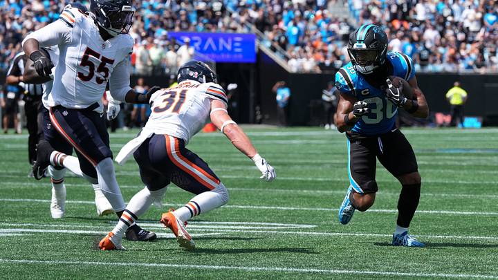 Sep 13, 2026; Charlotte, North Carolina, USA; Carolina Panthers running back Chuba Hubbard (30) runs with the ball while defended by Chicago Bears safety Dillon Thieneman (31) in the first quarter at Bank of America Stadium. Mandatory Credit: Jim Dedmon-Imagn Images Sep 13, 2026; Charlotte, North Carolina, USA; Carolina Panthers running back Chuba Hubbard (30) runs with the ball while defended by Chicago Bears safety Dillon Thieneman (31) in the first quarter at Bank of America Stadium. Mandatory Credit: Jim Dedmon-Imagn Images