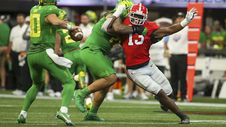 Sep 3, 2022; Atlanta, Georgia, USA; Georgia Bulldogs defensive lineman Mykel Williams (13) rushes the passer against the Oregon Ducks in the second quarter at Mercedes-Benz Stadium. Mandatory Credit: Brett Davis-Imagn Images Sep 3, 2022; Atlanta, Georgia, USA; Georgia Bulldogs defensive lineman Mykel Williams (13) rushes the passer against the Oregon Ducks in the second quarter at Mercedes-Benz Stadium. Mandatory Credit: Brett Davis-Imagn Images