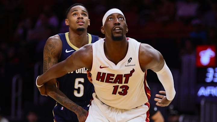 Oct 13, 2024; Miami, Florida, USA; Miami Heat center Bam Adebayo (13) defends against New Orleans Pelicans guard Dejounte Murray (5) during the second quarter at Kaseya Center. Mandatory Credit: Sam Navarro-Imagn Images Oct 13, 2024; Miami, Florida, USA; Miami Heat center Bam Adebayo (13) defends against New Orleans Pelicans guard Dejounte Murray (5) during the second quarter at Kaseya Center. Mandatory Credit: Sam Navarro-Imagn Images
