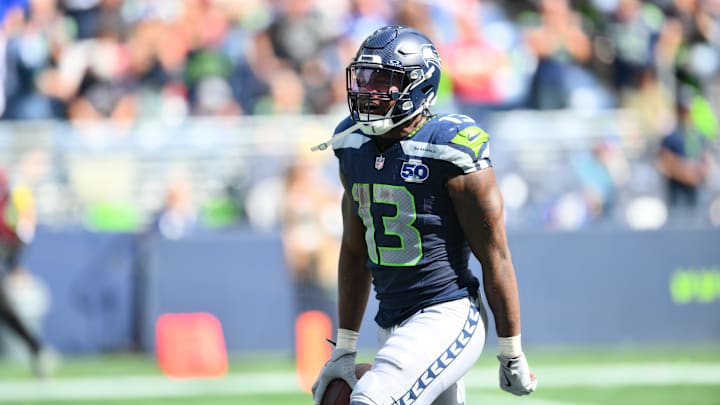 Sep 7, 2025; Seattle, Washington, USA; Seattle Seahawks linebacker Ernest Jones IV (13) celebrates after a play during the second half against Washington Commanders at Lumen Field.