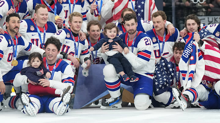 The U.S. men’s hockey team brought the late Johnny Gaudreau’s children onto the ice after beating Canada in the gold medal match at the Milan Cortina Olympics.