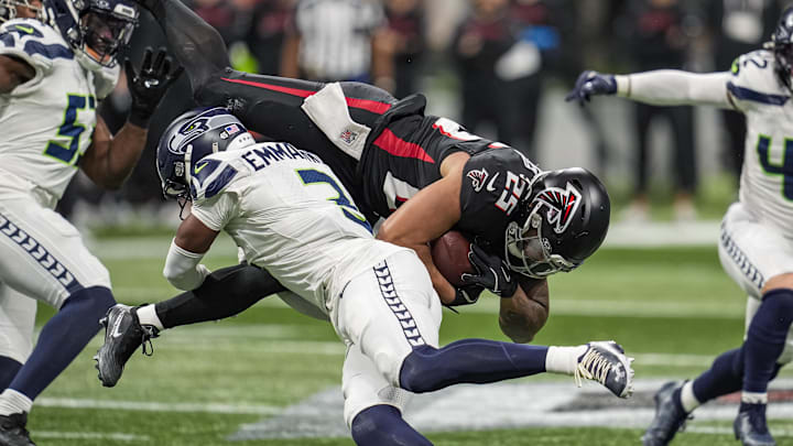 Dec 7, 2025; Atlanta, Georgia, USA; Seattle Seahawks safety Nick Emmanwori (3) upends Atlanta Falcons running back Tyler Allgeier (25) during the first half at Mercedes-Benz Stadium. Mandatory Credit: Dale Zanine-Imagn Images Dec 7, 2025; Atlanta, Georgia, USA; Seattle Seahawks safety Nick Emmanwori (3) upends Atlanta Falcons running back Tyler Allgeier (25) during the first half at Mercedes-Benz Stadium. Mandatory Credit: Dale Zanine-Imagn Images
