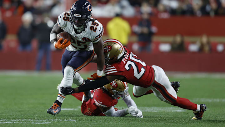 Bears running back Kyle Monangai carries with 49ers cornerback Upton Stout (20) trying to make the tackle in Sunday's Bears loss.